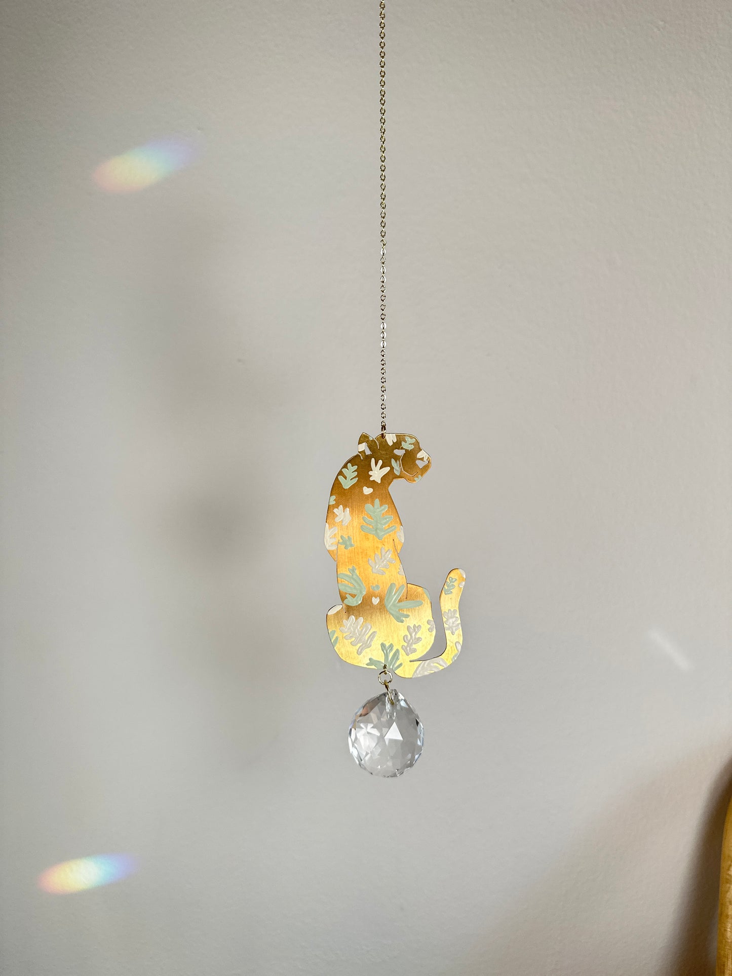 painted cheetah suncatcher