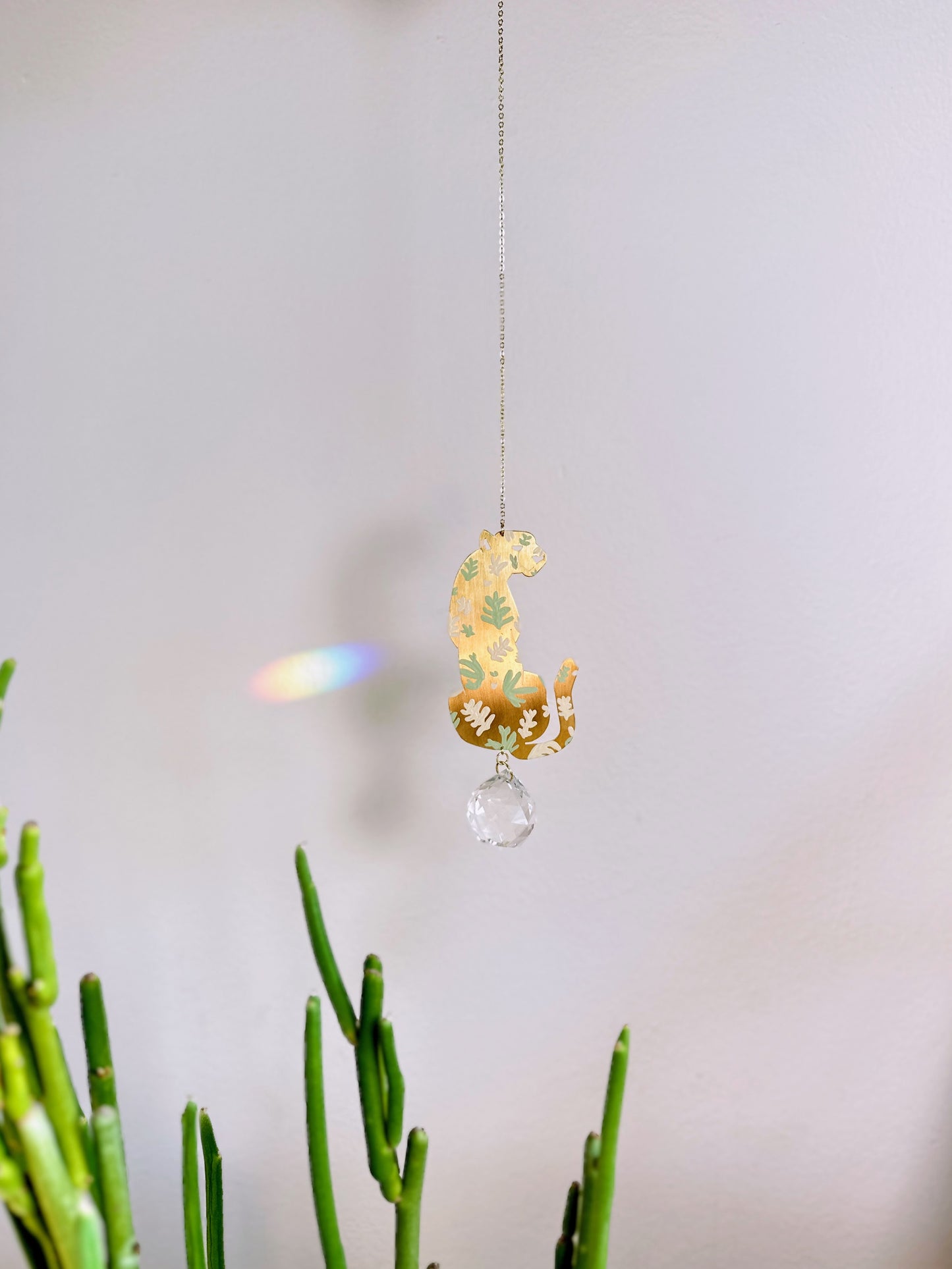 painted cheetah suncatcher